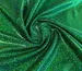 Трикотаж масло нарядное точечная голограмма радужная, зеленый на черном  (отрез 1 м) - фото 1 - интернет-магазин tkani-atlas.com.ua