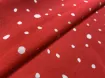 Штапель нерівномірні горошки, білий на червоному - інтернет-магазин tkani-atlas.com.ua