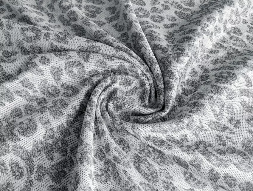 Трикотаж жаккард меланжевий леопард, сірий з білим - фото 1 - інтернет-магазин tkani-atlas.com.ua