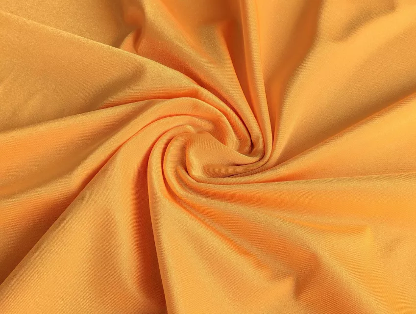Бифлекс блестящий, апельсиновый - фото 1 - интернет-магазин tkani-atlas.com.ua