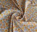 Штапель Бельмондо цветочное плетение, оранжевый на молочном - фото 1 - интернет-магазин tkani-atlas.com.ua