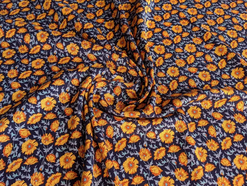 Штапель Бельмондо цветочное плетение, оранжевый на темно-синем - фото 1 - интернет-магазин tkani-atlas.com.ua