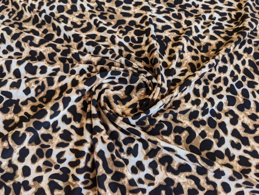 Трикотаж масло леопард, коричневий з чорним - фото 1 - інтернет-магазин tkani-atlas.com.ua