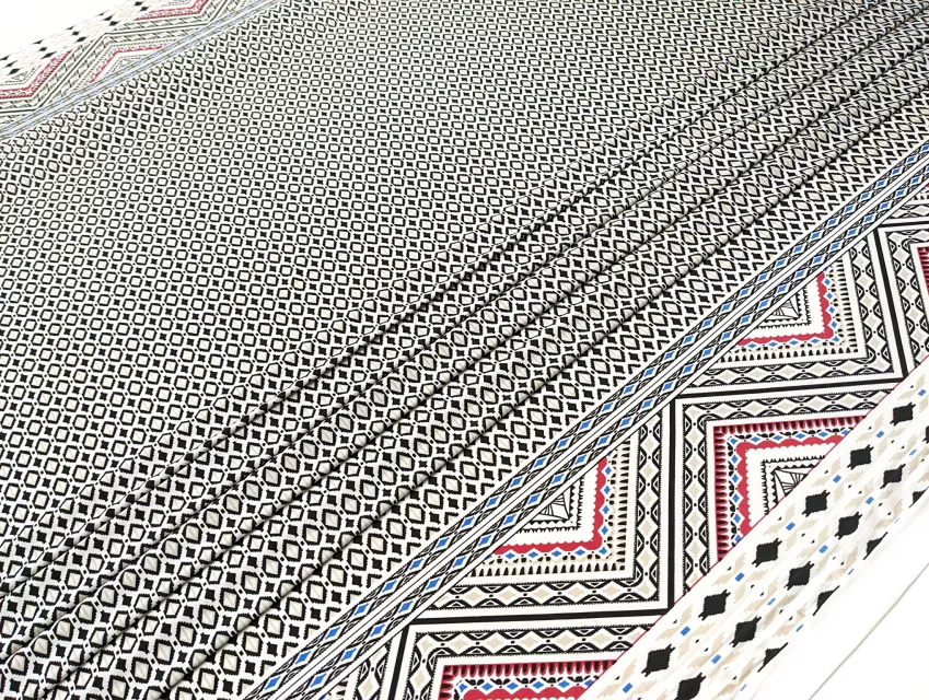 Трикотаж масло двосторонній купон 16.5см, чорний на молочному - фото 1 - інтернет-магазин tkani-atlas.com.ua