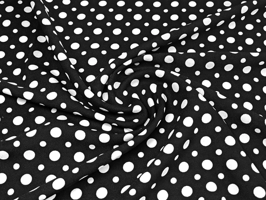 Американський креп малюнок мікс горошків, молочний на чорному - фото 1 - інтернет-магазин tkani-atlas.com.ua