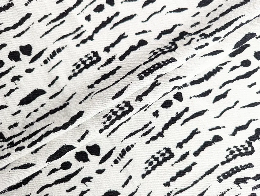 Лен с вискозой пятнистый, молочный с черным - фото 1 - интернет-магазин tkani-atlas.com.ua