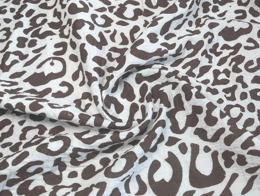 Муслін малюнок уцінка (прокрас), коричневий на молочному - фото 1 - інтернет-магазин tkani-atlas.com.ua