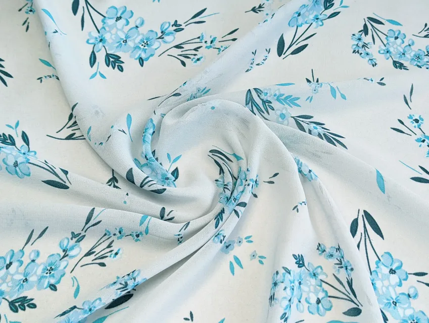 Шифон креповий квітковий політ, сіро-блакитний - фото 1 - інтернет-магазин tkani-atlas.com.ua