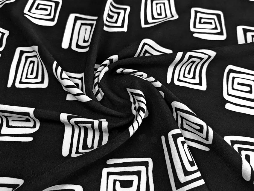 Американський креп малюнок завитки, чорний з молочним - фото 1 - інтернет-магазин tkani-atlas.com.ua