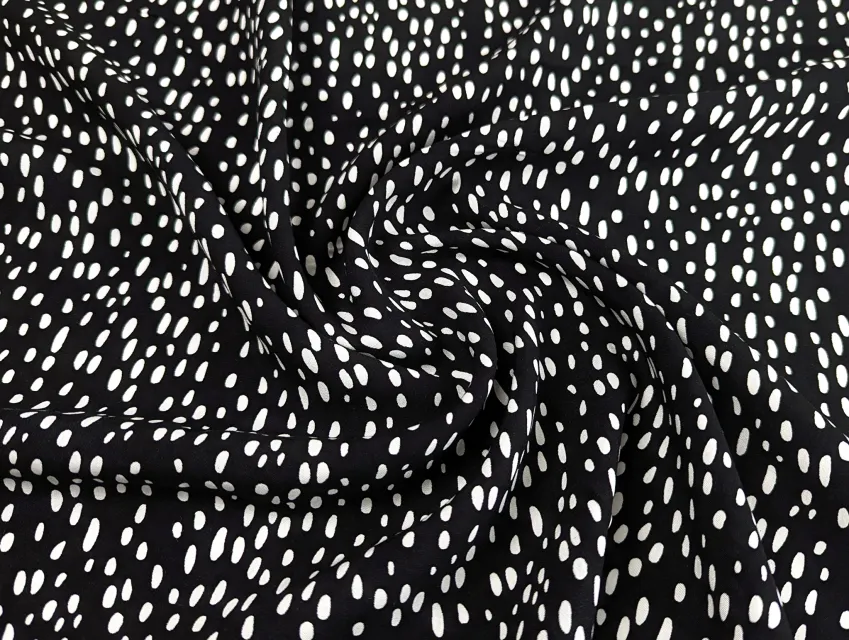 Штапель шелковистый россыпь горошков, белый на черном - фото 1 - интернет-магазин tkani-atlas.com.ua