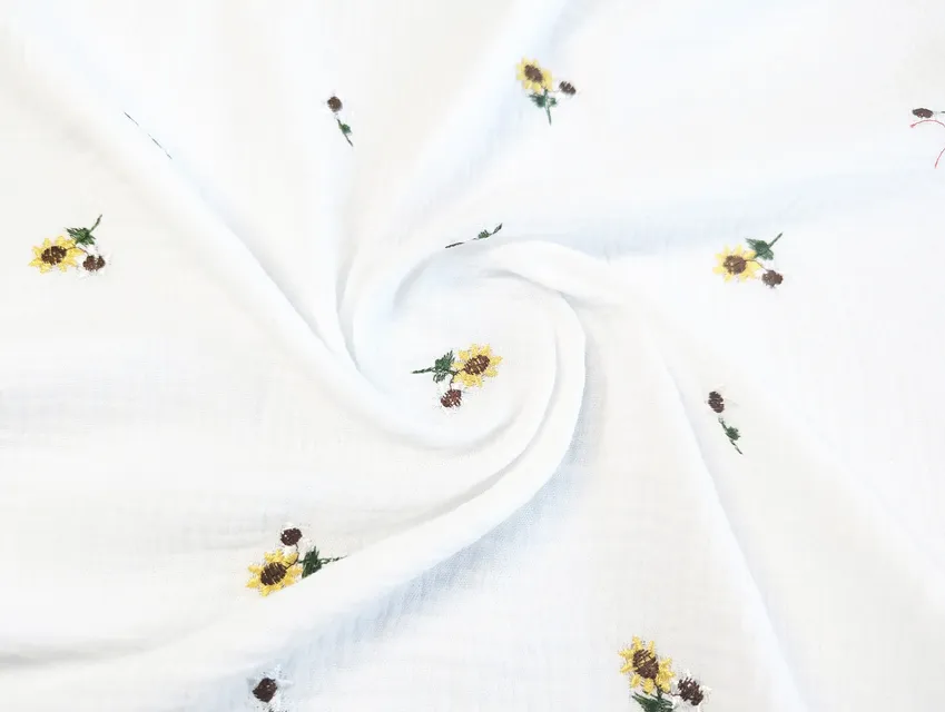 Муслін вишивка соняшник, молочний - фото 1 - інтернет-магазин tkani-atlas.com.ua