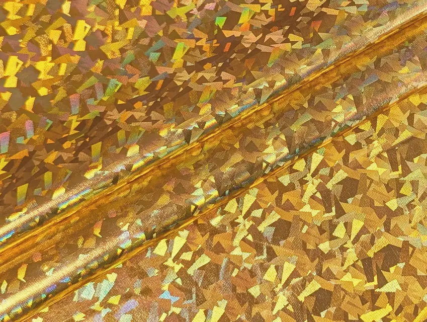Трикотаж масло нарядное голограмма радужная, золото на черном - фото 1 - интернет-магазин tkani-atlas.com.ua