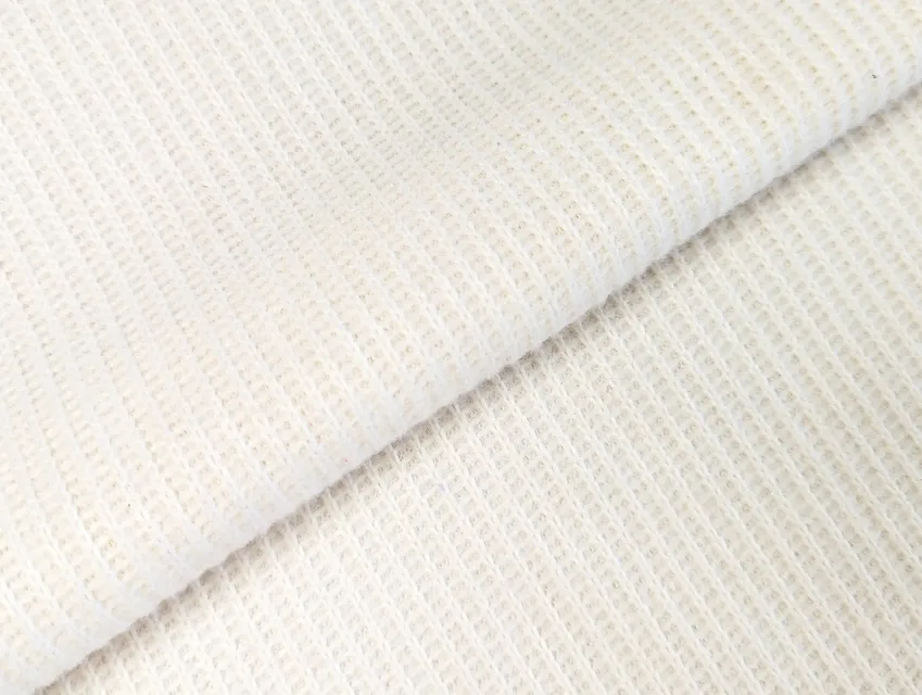 Трикотаж з рельєфною в'язкою, молочний - фото 1 - інтернет-магазин tkani-atlas.com.ua